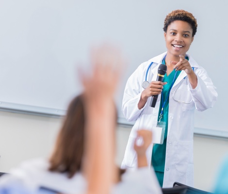 Doctor at In-Person Seminar